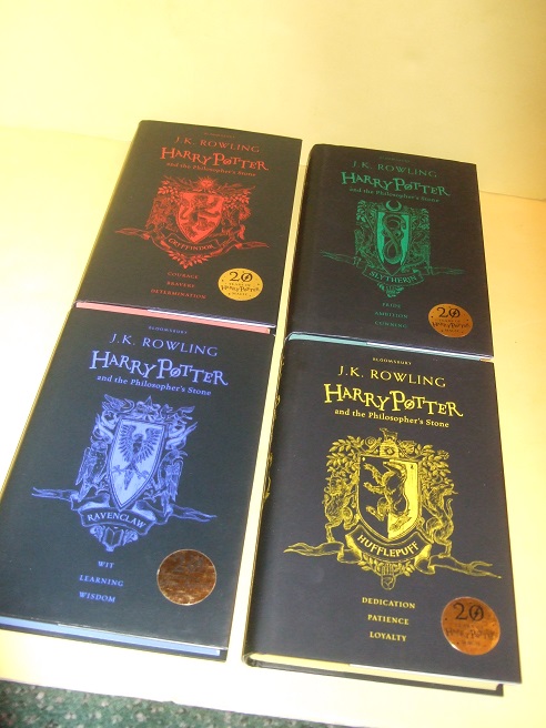 Image for FOUR VOLUMES:  Harry Potter & the Philosopher's Stone -book 1 of the Series ( Volume ONE)( The 1st Bloomsbury HUFFLEPUFF / Slytherin / Ravencalw / Gryffindor - House Colours Edition / Twentieth /  20th Anniversary edition )
