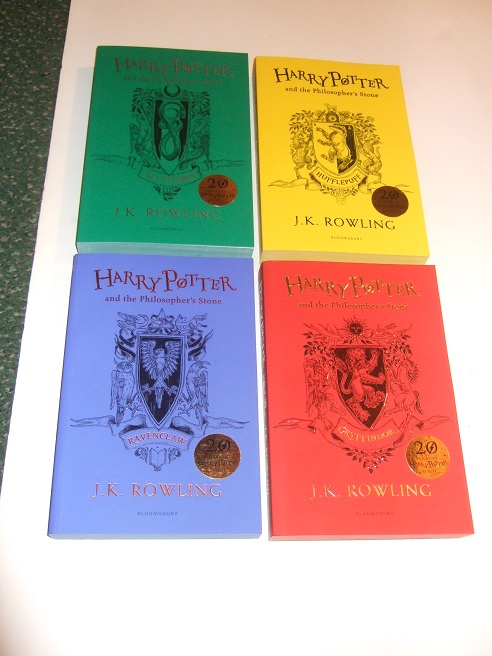 Image for FOUR VOLUMES:  Harry Potter & the Philosopher's Stone -book 1 of the Series ( Volume ONE)( The 1st Bloomsbury HUFFLEPUFF / Slytherin / Ravencalw / Gryffindor - House Colours Edition / Twentieth /  20th Anniversary edition )