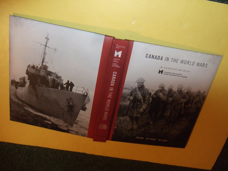 Image for Canada in the World Wars / Canadian War Museum ( WWI / WWII )(inc. Facsimiles of Maps, Recruitment Posters, Letters, Booklets, Pamphlets; Aerial Photos; Pilot's Log Book; Trench Newspapers; German U-Boat Handbook; Postcards; Telegram Bing Coughlin Poster)