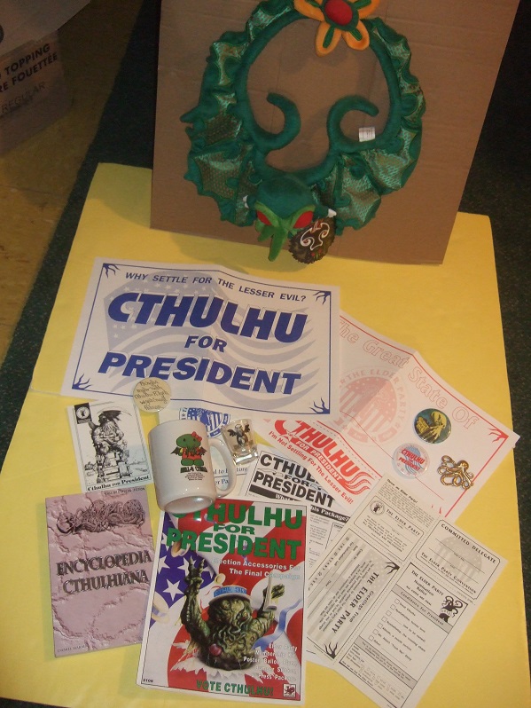 Image for CTHULHU GROUPING: Encyclopedia Cthulhiana  / Cthulhu for President 1992 / Cthulhu Christmas Wreath / Cthulhu Shotglass & Coffee Mug  & Pinback Buttons ( ( H P Lovecraft / Cthulhu Mythos related) book includes: History of the Necronomicon )